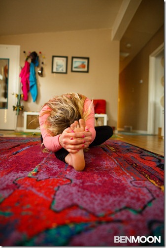 Professional skier Caroline Gleich practicing restorative yoga in her home in Salt Lake City, Utah